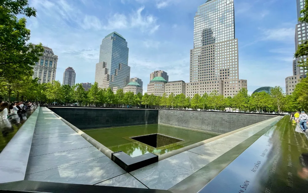 Things to Do in NYC 5 The North Pool at the 9/11 Memorial with names inscribed in bronze