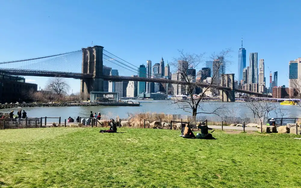 Things to Do in NYC 10 Brooklyn Bridge Park waterfront with the Lower Manhattan skyline across the East River
