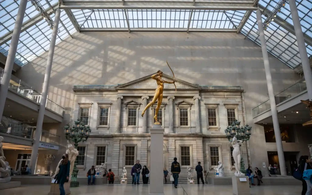 The Metropolitan Museum of Art: Tickets, Hours, and a Route 4 The glass-roofed Charles Engelhard Court with its historic bank facade in The Met's American Wing