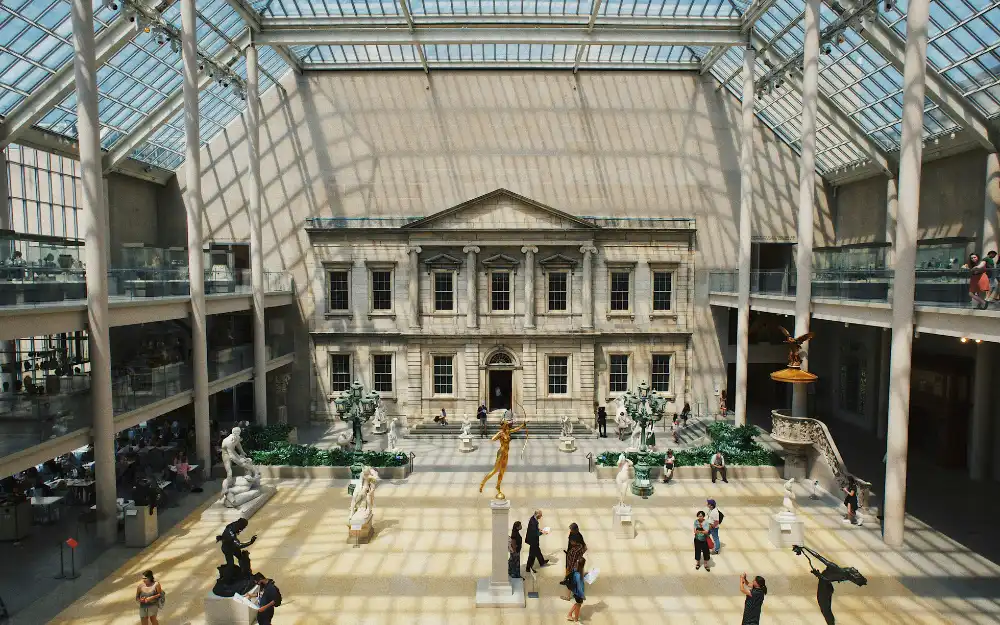 Things to Do in NYC 12 Sunlight through the glass roof of the Charles Engelhard Court at the Metropolitan Museum of Art in New York City