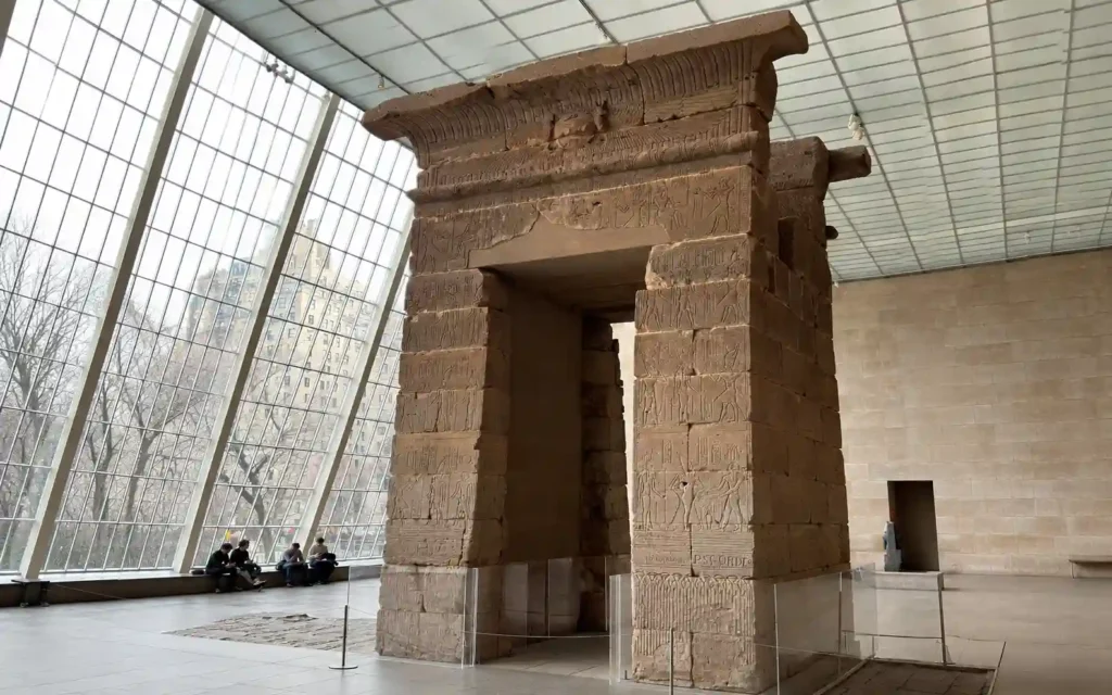 The Metropolitan Museum of Art: Tickets, Hours, and a Route 2 The Temple of Dendur behind its reflecting pool in the glass-walled hall at The Met