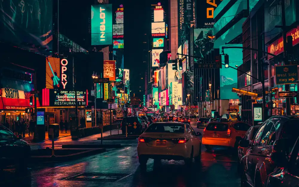 Things to Do in NYC 8 Illuminated billboards and crowds in Times Square at night