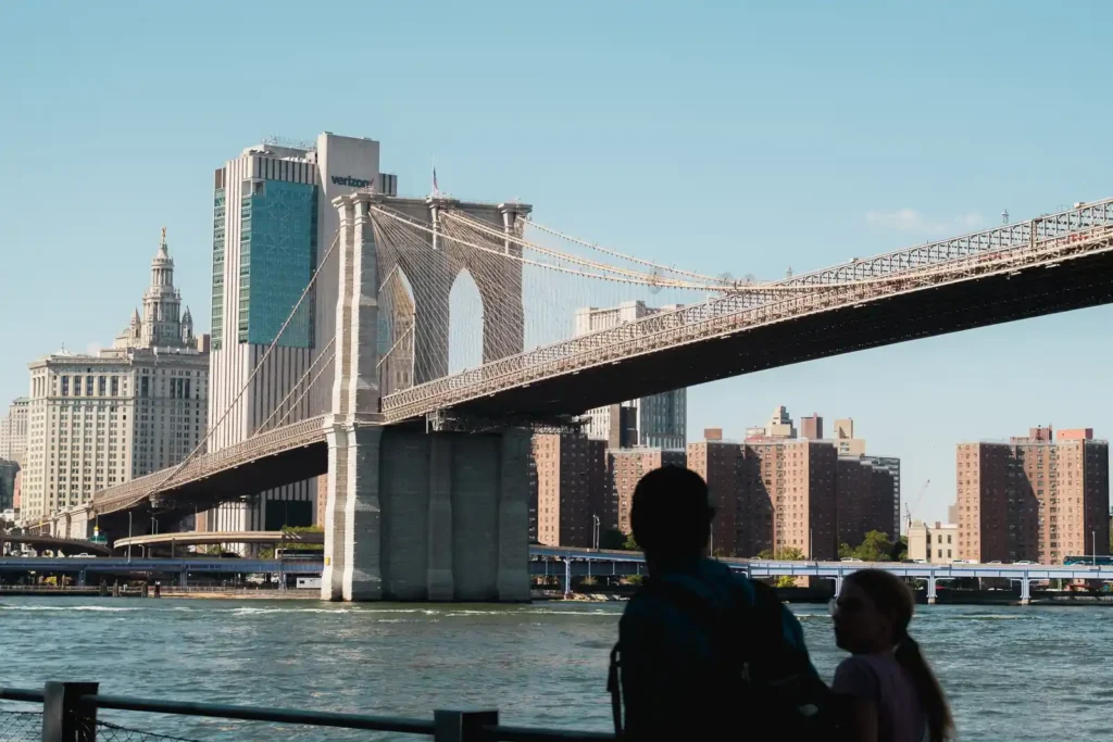 Walking the Brooklyn Bridge: Entrances, Timing, and What Changed in 2026 4 The Brooklyn Bridge and the Lower Manhattan skyline seen from the Brooklyn waterfront